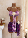 Girly purple three piece swimsuit