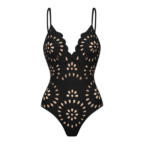 Black swimsuit with cut-out floral patterns on a white background