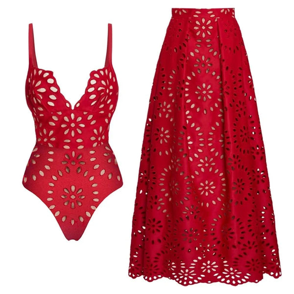 Red swimsuit and red skirt with cut-out patterns on a white background