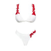 White bikini with red floral patterns on a white background