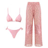 Pink bikini set and lace pants on a white background