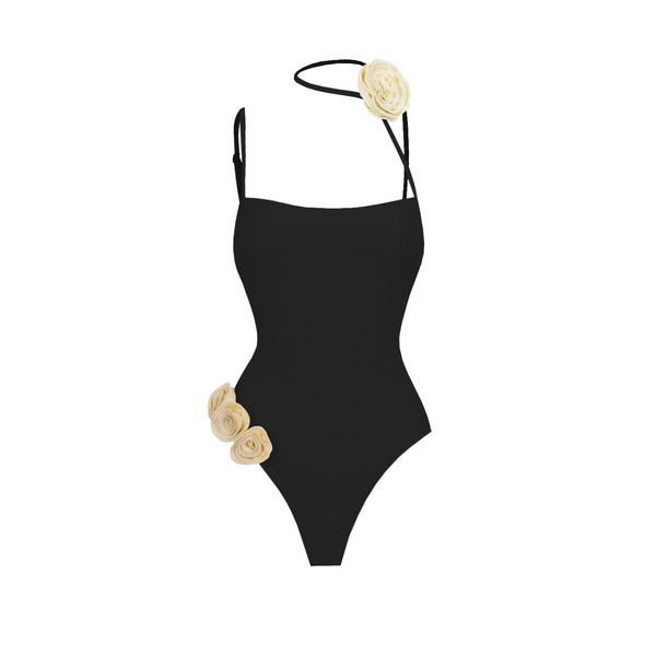 Black swimsuit with floral details on a white background