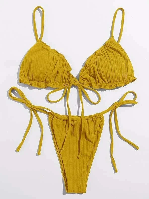 Yellow bikini set on a white background