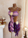 Girly purple three piece swimsuit