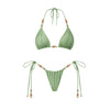 Green bikini set with beaded straps on a white background