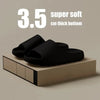 Black slides on a beige platform with text indicating '3.5 super soft cm thick bottom' on a beige background