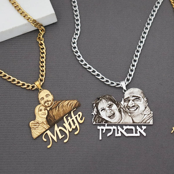 Two necklaces with personalized photo pendants on a gray surface.
