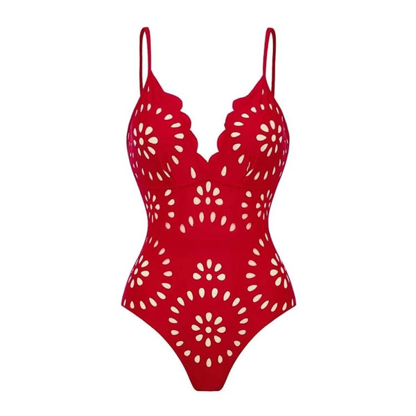 Red swimsuit with white floral pattern on a white background