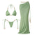 Green bikini set with matching long skirt on a white background