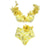 Yellow floral bikini set on a white background