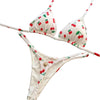 Bikini set with cherry pattern on a decorative surface