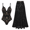 Black swimsuit with cut-out design and matching black skirt on a white background