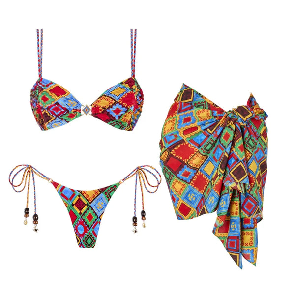 Colorful bikini set with matching sarong on a white background