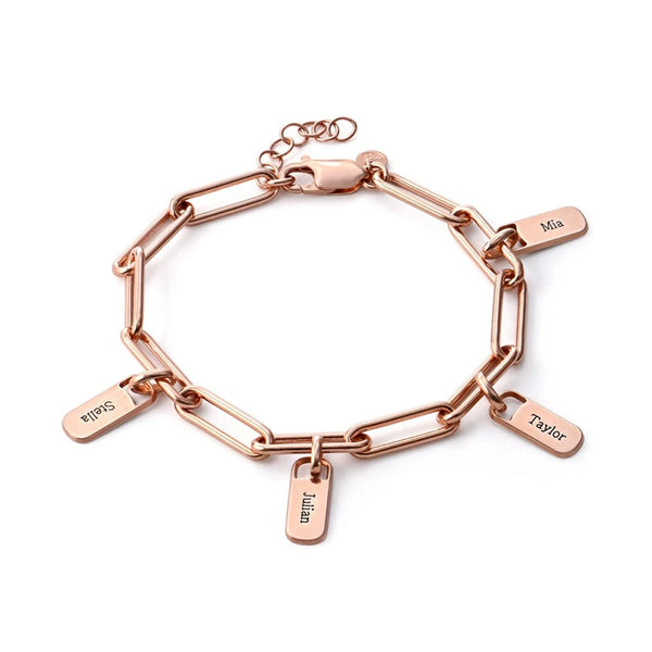 Rose gold chain bracelet with name tags on a white background