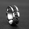 Silver ring with chain design on a dark gray background