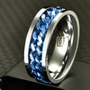 Silver ring with blue carbon fiber inlay on a dark background