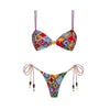 Colorful bikini set with geometric pattern on a white background