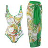 Colorful swimsuit set with paisley pattern on a white background