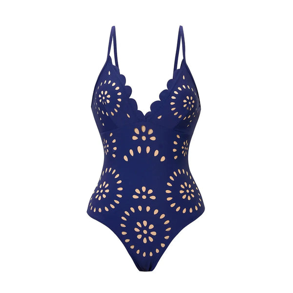 Navy blue swimsuit with floral cut-out design on a white background