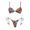 Colorful bikini set with geometric pattern on a white background