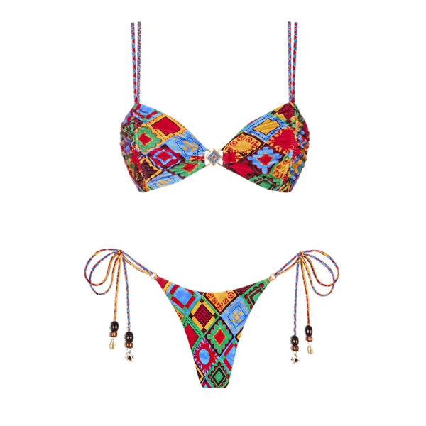 Colorful bikini set with geometric pattern on a white background