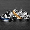 Set of five chain-link rings in different colors on a dark background