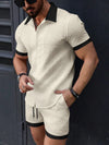 Designed for summer, this men's beach shorts set from Sexikinis Swim combines comfort and style. Made from a lightweight blend of polyester and cotton, it features a casual patchwork design with a single-breasted closure and notched collar. The elastic waist ensures a perfect fit, while short sleeves keep you cool. Crafted with attention to detail and free from harmful chemicals, this thin, breathable set is ideal for relaxed beach days.