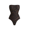 Leopard print strapless bodysuit on a white background