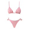 Pink bikini set on a white background