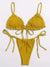 Yellow bikini set on a white background