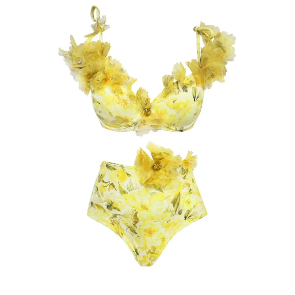 Yellow floral bikini set on a white background
