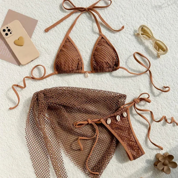 Brown bikini set with matching cover-up on a light background