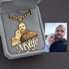 Gold necklace with a pendant of a couple and 'My life' text, displayed in an open jewelry box.