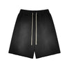 Black shorts with a drawstring on a white background